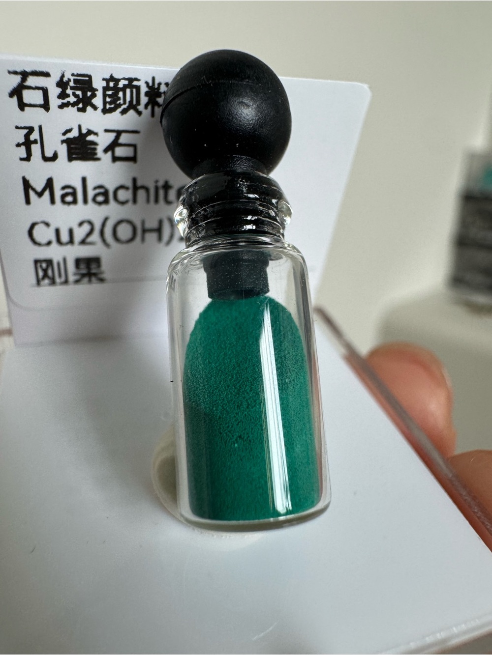 Malachite powder in bottle